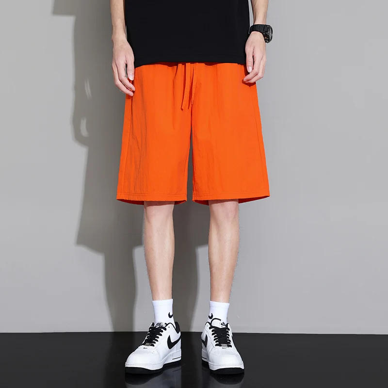 Description Picture 4 of itemFashion Elastic Lace Up Pockets Solid Color Casual Shorts Men Clothing 2024 Summer New Loose Young Style High Waist Knee Shorts