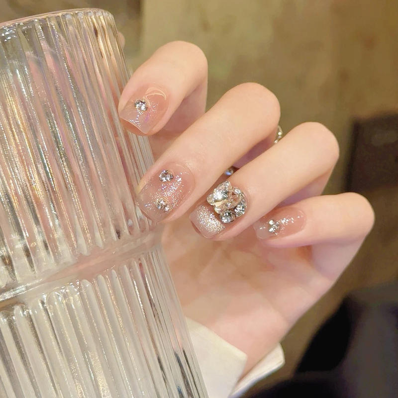 Description Picture 5 of item10Pcs Sparkling Cat Eye Fake Nails with Shining Rhinestone Design False Nails Press on Mid Length Ballet Full Cover Manicure