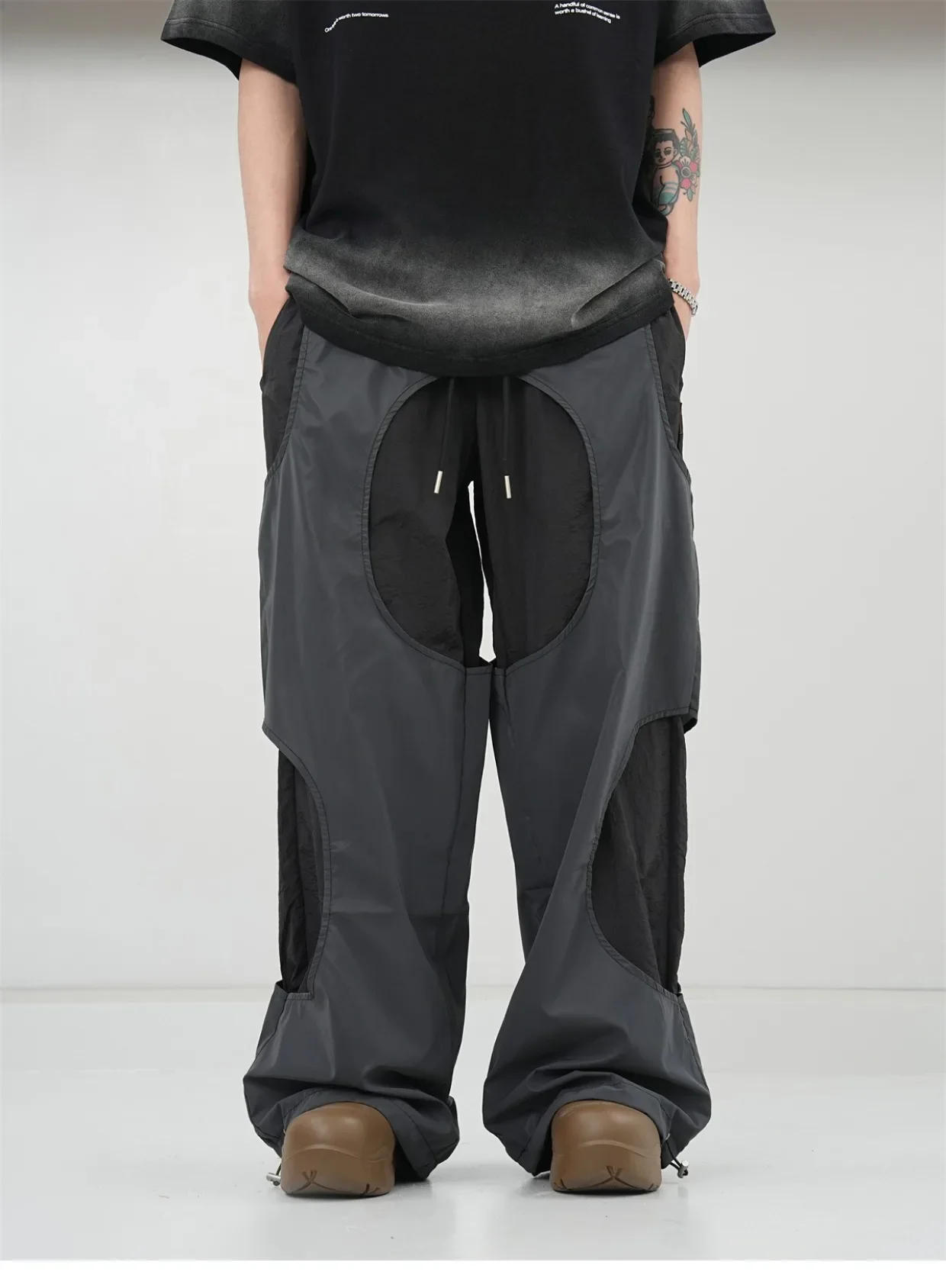 Description Picture 6 of itemAmerican Retro Hollow out Stitching Reflective Drawstring Fake Two Pieces Design Loose Wide Leg Sports Casual Pants