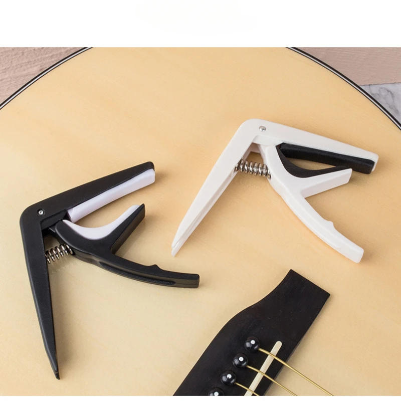 Description Picture 2 of itemGuitar Capo for 6 String Acoustic Classic Guitar Electric Guitar Tuning Clamp Musical Instrument Ukulele Bass Guitar Accessories