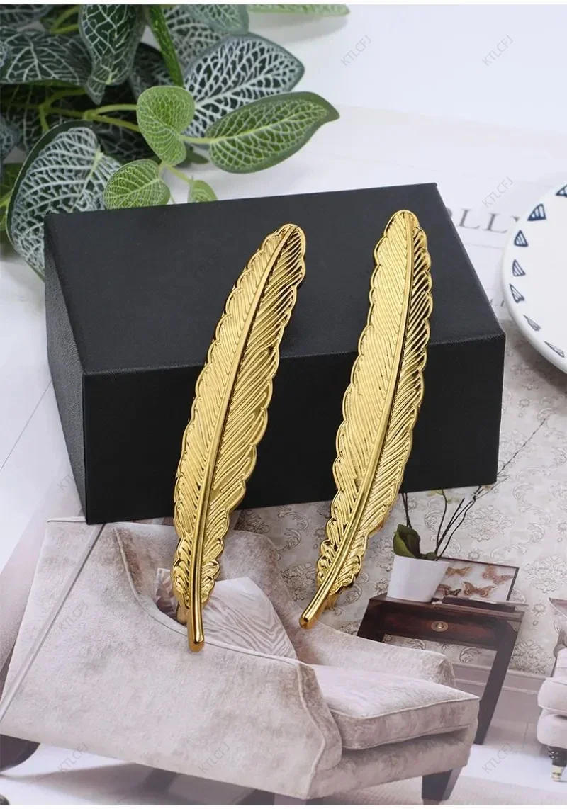 Description Picture 3 of itemPure Brass Cabinet Door Handle Light Luxury Nordic Butterfly Feather All Copper Drawer Handle American Gold Cabinet Door Handle