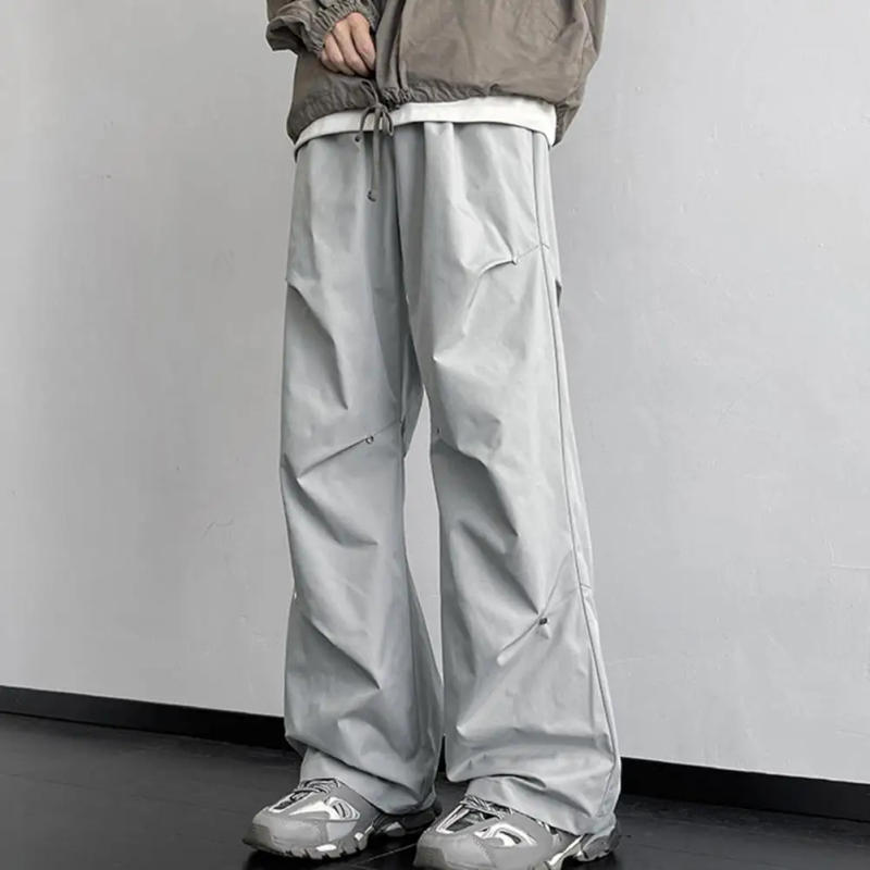 Description Picture 3 of itemWaterproof Unisex Cargo Pants Rivet Decor Loose Wide Leg Trousers Side Pockets Elastic Waist Streetwear Outdoor Long Trousers