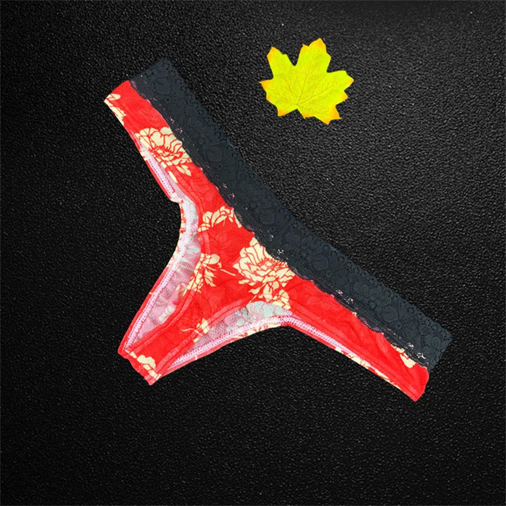 Description Picture 2 of itemSexy Ultra Thin Underwear Men Thong Transparent Lace Mesh Low-Rise G-string Male Panties Printed Lingerie