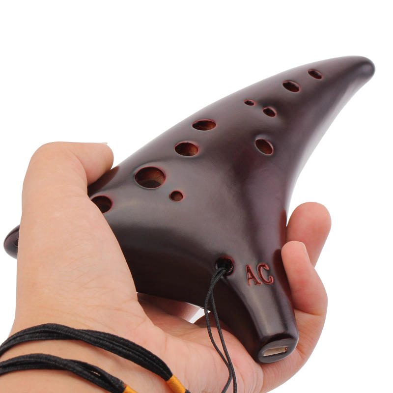 Description Picture 5 of item12 Holes Ocarina Zelda Alto ToneC Smoked Burn Ceramic Ocarina Flute with Song Book Neck Cord Carry Bag Musical Instruments