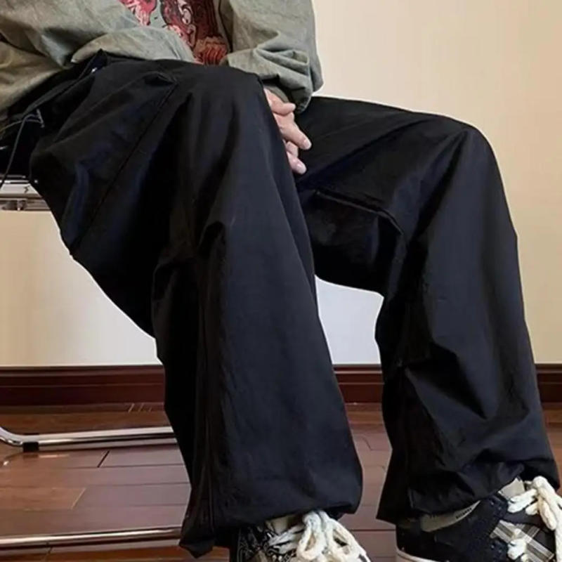 Description Picture 6 of itemStreetwear 2024 Spring Harem Casual Pants Men Elastic Waist Solid Color Cargo Pants Multi Pocket Loose Baggy Pants For Women