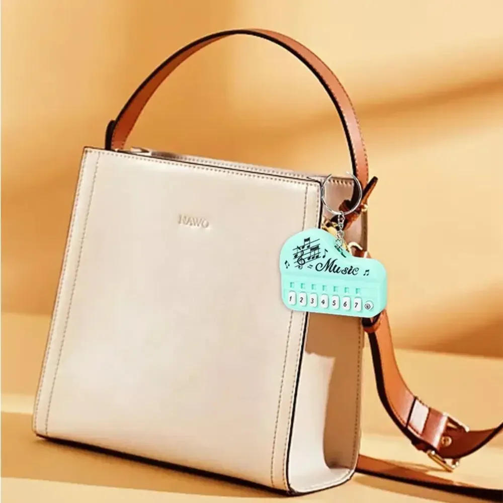 Description Picture 3 of itemMini Lovely Fresh Creative Cartoon Music Electronic Piano Keychains Couple Pendant Cute Exquisite Key Ring Funny Birthday Gift
