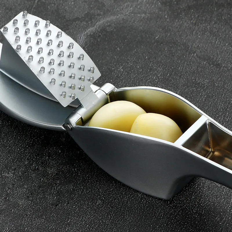 Description Picture 3 of itemGarlic Press Crusher Mincer with Sturdy Construction Professional Food Grade Rust proof Easy Squeeze and Clean