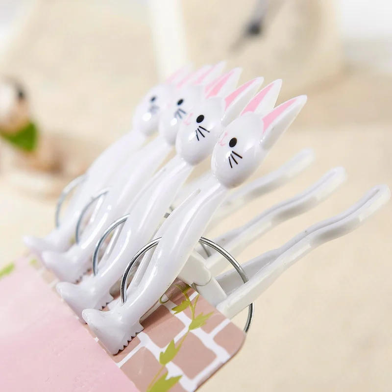 Description Picture 6 of item4 Pcs/set Creative Cat Cartoon Clip Bags Strong Plastic Clothes-pin Shape Socks Hanging Pegs Clamps Laundry Photo Holder
