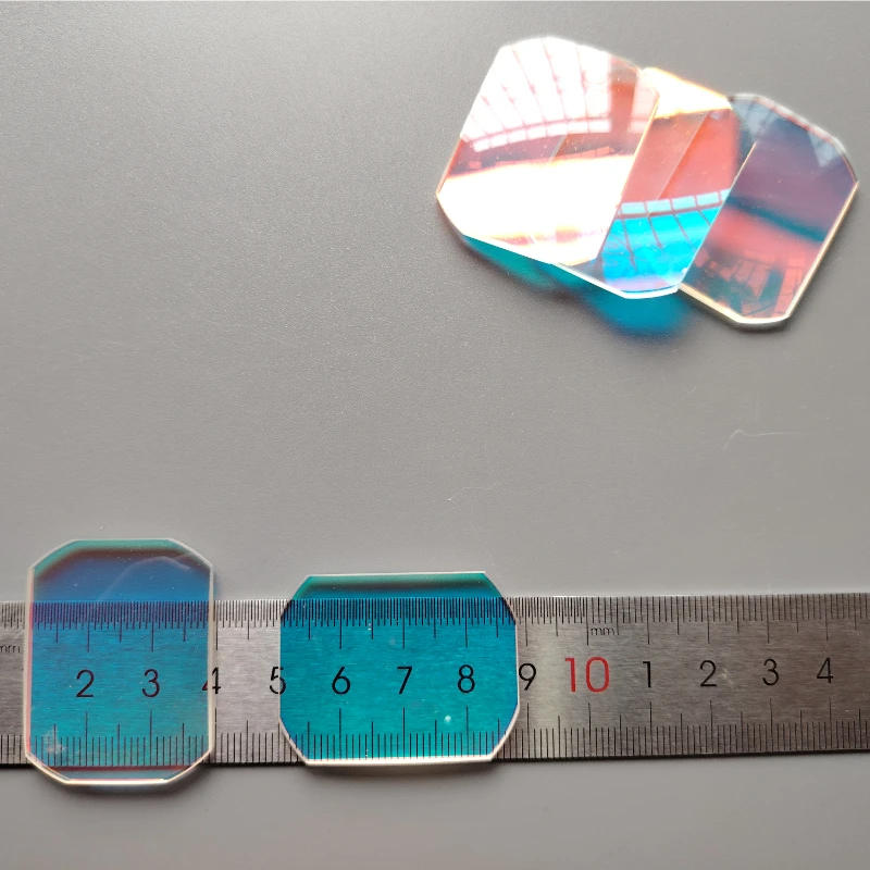Description Picture 2 of item5Pcs Defective 30x39mm Concave-Convex  Lens Half Reflect Transmission Aspheric Laser Lens Beautiful Coating Prisms Stained Glass