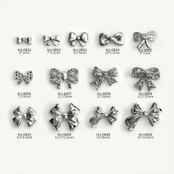 20PCS Glossy Silver Simple Delicate 3D Twisted Bowknots Ribbon Bow Tie Alloy Nail Art Rhinestones Decorations Manicure Ornaments