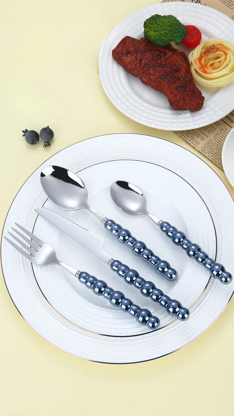 Description Picture 5 of item4Pcs Gold Dinnerware Set Stainless Steel Cutlery Knife Tea Fork Coffee Spoon Pearl Ceramic Handle Flatware Utensils for Kitchen
