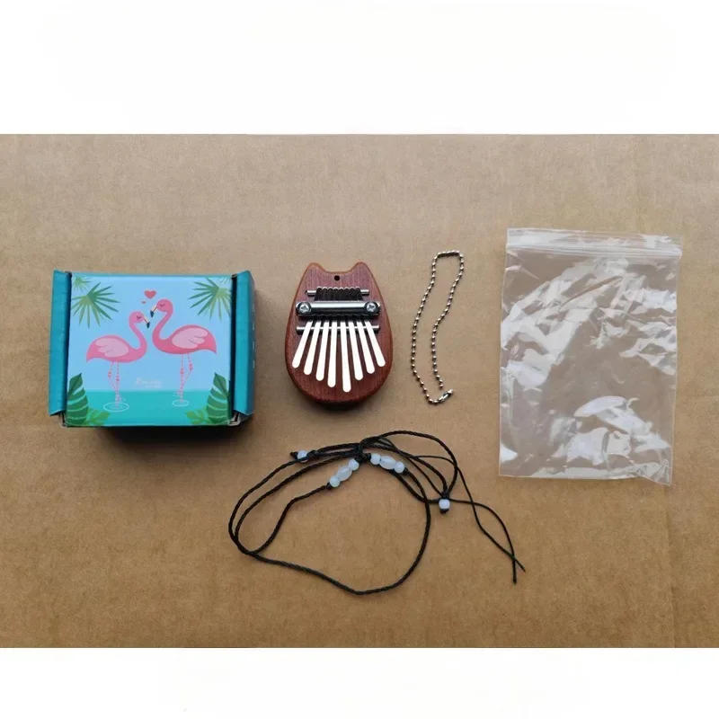 Description Picture 5 of itemNewest 8 Key Mini Kalimba Thumb Piano Wooden/Acrylic Small Wearable Musical Instrument Pendant Mbira Finger Piano For Adult Kids