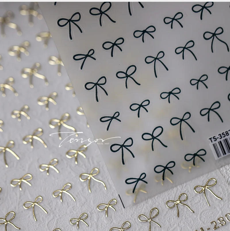 Description Picture 3 of itemLovely Gold Silver Black White Line Bowknot 3D Self Adhesive Nail Art Decorations Stickers Ribbon Cute Manicure Decals Wholesale