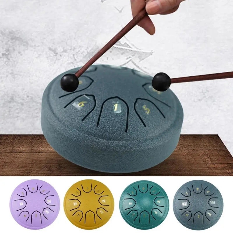 Description Picture 3 of item4.5 Inch 8 Tone Steel Tongue Drum Mini Hand Pan Drums Drumsticks Music Tambourine Drum With Accessories Instrument