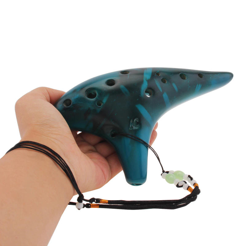 Description Picture 6 of item12 Holes Ocarina Zelda Alto ToneC Smoked Burn Ceramic Ocarina Flute with Song Book Neck Cord Carry Bag Musical Instruments