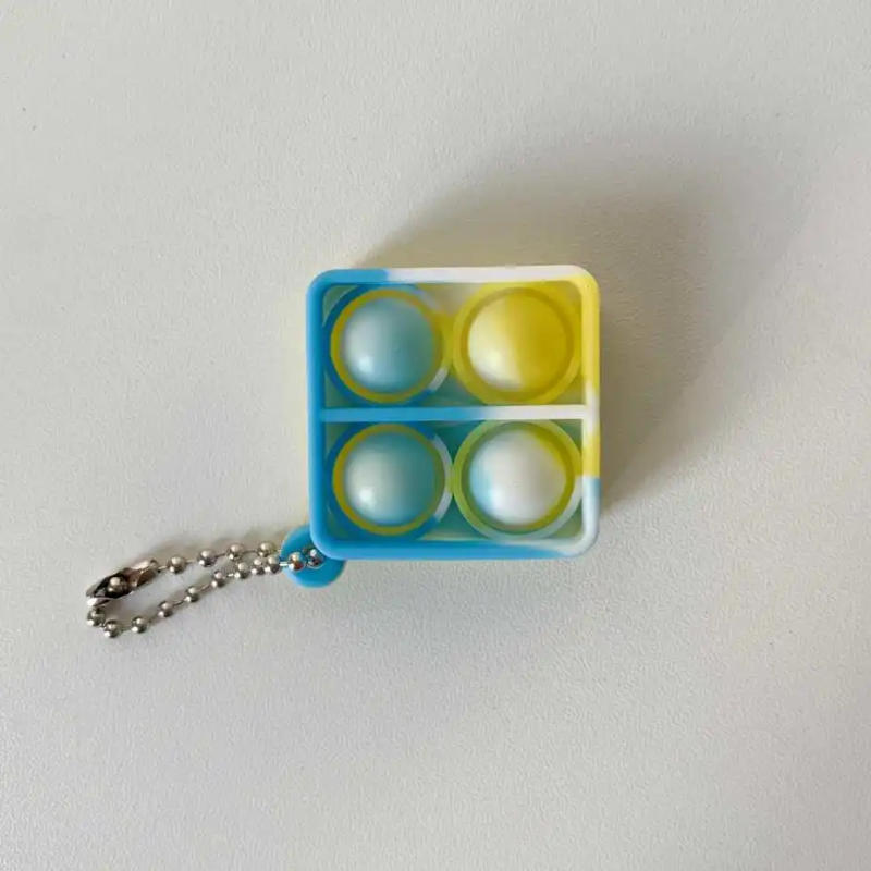 Description Picture 4 of item10/20Pcs Pop Fidget Toys Mini Keychain Toddler Sensory Toy Gifts Kids Birthday Party Favors Pinata Goodie Bag Fillers Wedding