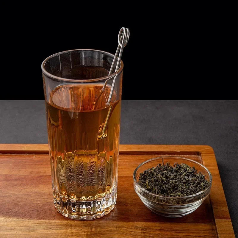 Description Picture 3 of itemStainless Steel Tea Infuser Sphere Filter Ball Teaspoon Squeeze Creative Strainer Tea Drip Handle Seasoning Mesh Spoon Ball