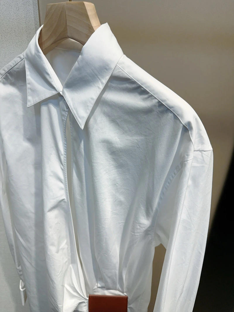 Description Picture 4 of itemwomen ladies embossed leather label asymmetrical design pleated shirt long blouse cotton top