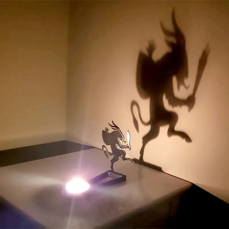 Description Picture 6 of itemHalloween Candle Holder Funny Metal Shadow Stand Candlestick Atmosphere Creative Scary Candle Stands Holder For Party Decor