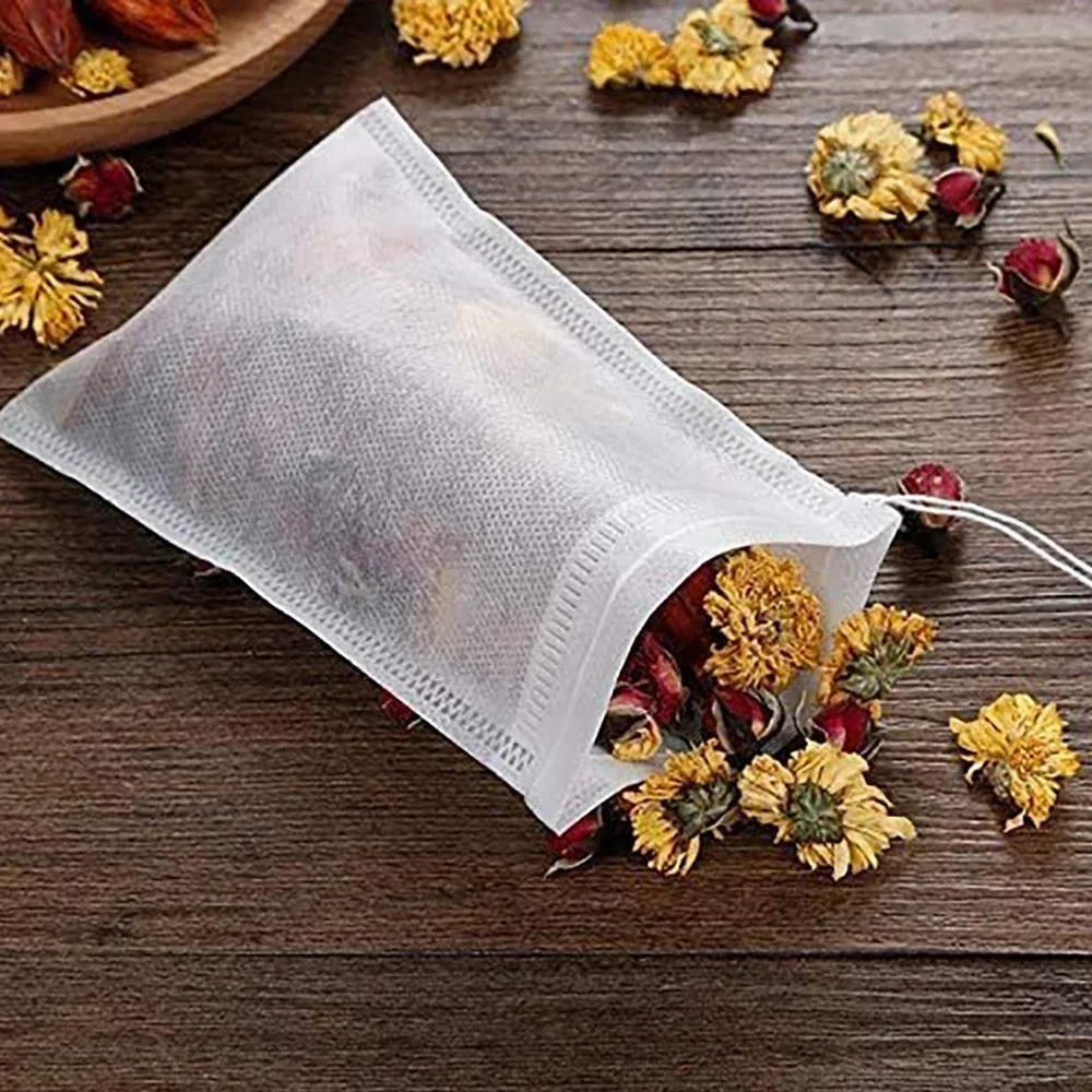 Description Picture 6 of item100PCS Disposable Non-woven Fabric Teabags With String Kitchen Teaware Coffee Loose Tea Spice Bag Wholesale Tea Filter Bags