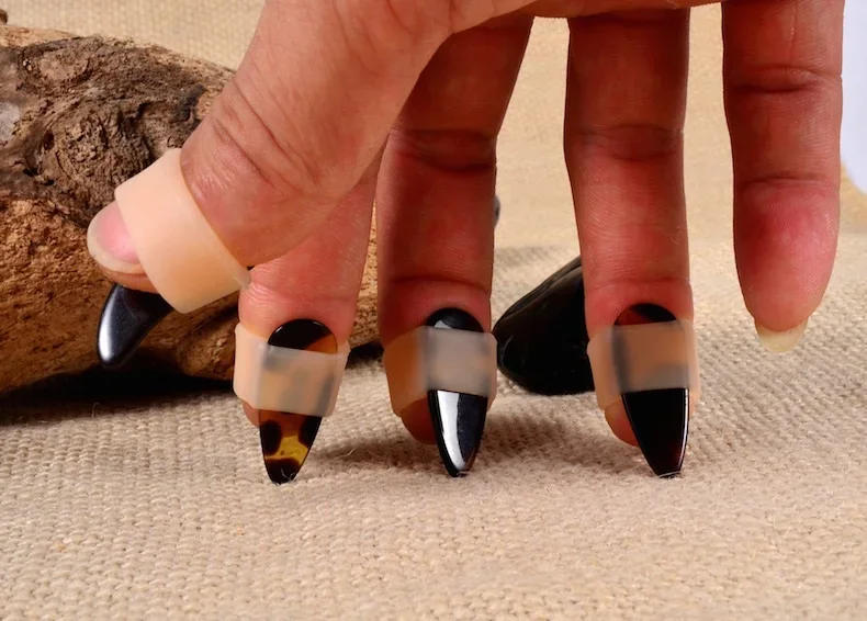 Description Picture 4 of item8PCS/Set 4L+4R Silicone Guzheng Thumb Finger Guard Protector String Instrument accessories (Not include nail pick)