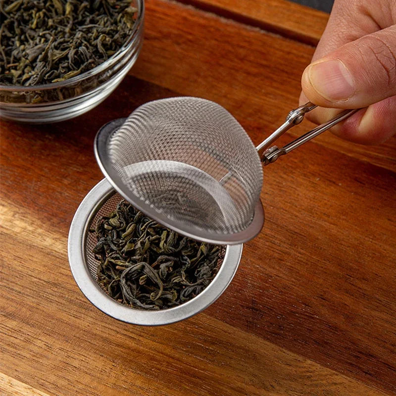 Description Picture 4 of itemStainless Steel Tea Infuser Sphere Filter Ball Teaspoon Squeeze Creative Strainer Tea Drip Handle Seasoning Mesh Spoon Ball
