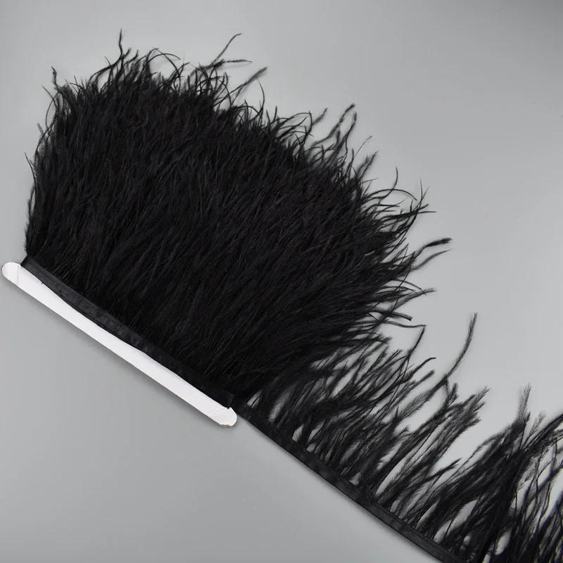 Description Picture 6 of item1Meter White Ostrich Feathers on Ribbon Tape 10-15CM Feather Tassel Fringe Trim Boa Sewing Flecos Needlework Clothes Decoration