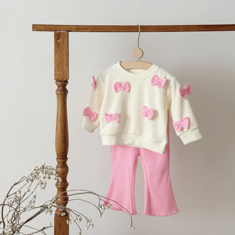 Description Picture 5 of item2025 Spring Autumn New Kids Cute Bowknot Long Sleeved Outfit Set Baby Boy Girl Cartoon Casual Tracksuit Pink Flared Pants Suit