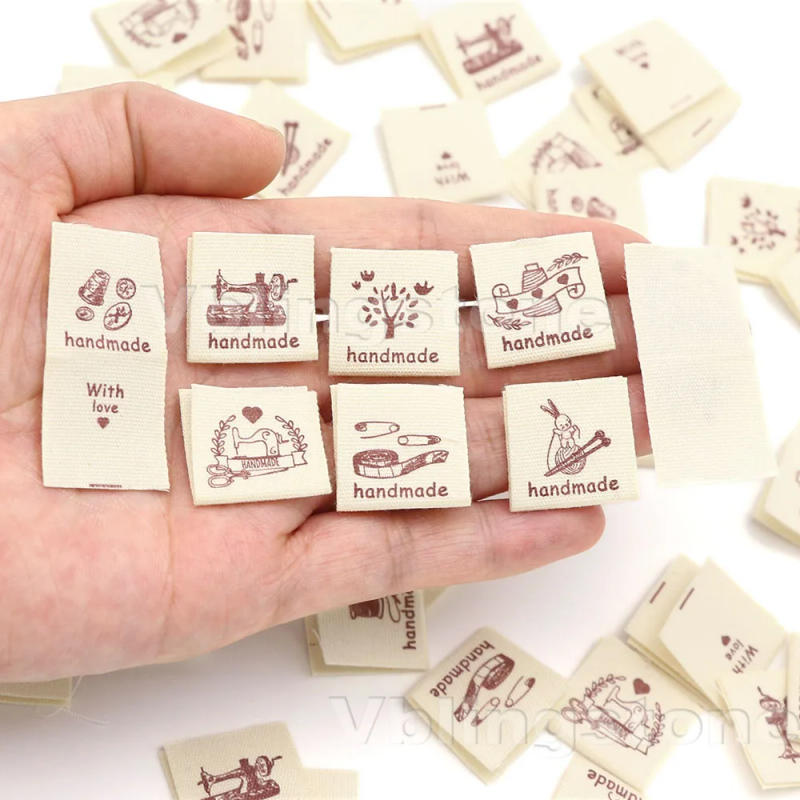 Description Picture 4 of item50Pcs Sewing Machine Pattern Handmade Label Fold Clothes Labels DIY Hat/Gift/Bag Decoration Sewing Accessories 20x40MM