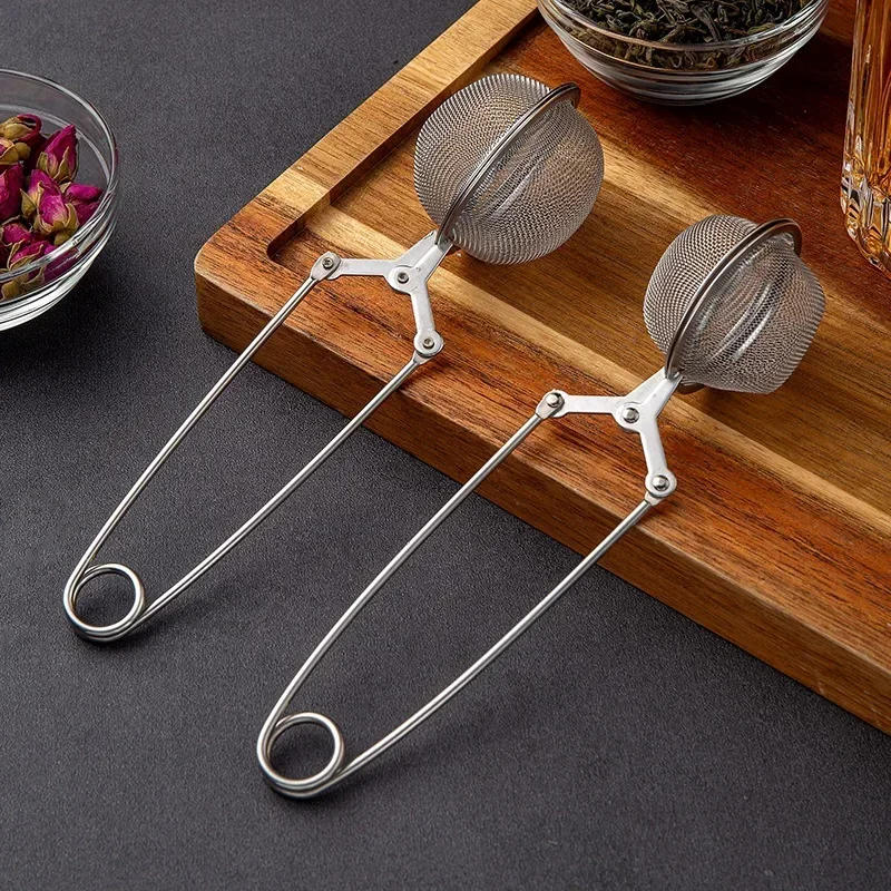 Description Picture 2 of itemStainless Steel Tea Infuser Sphere Filter Ball Teaspoon Squeeze Creative Strainer Tea Drip Handle Seasoning Mesh Spoon Ball
