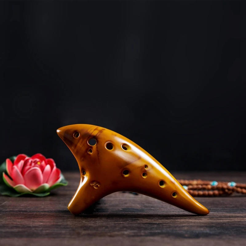 Description Picture 3 of item12 Holes Ocarina Zelda Alto ToneC Smoked Burn Ceramic Ocarina Flute with Song Book Neck Cord Carry Bag Musical Instruments
