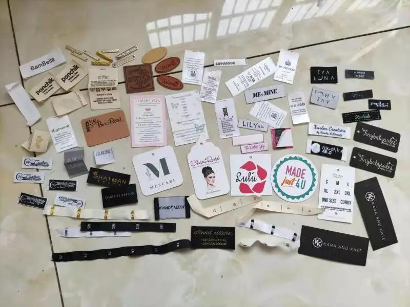 Description Picture 2 of item50pcs White Size Labels Fold satin print Sizes label for baby 0-6M 3M 6M 9M 12M 18M 24M 36M One size Garment Tag