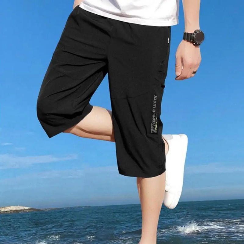 Description Picture 5 of itemSolid Color Cropped Pants Men's Elastic Waist Cropped Pants with Zipper Pockets Soft Breathable Mid-calf Trousers in for Men