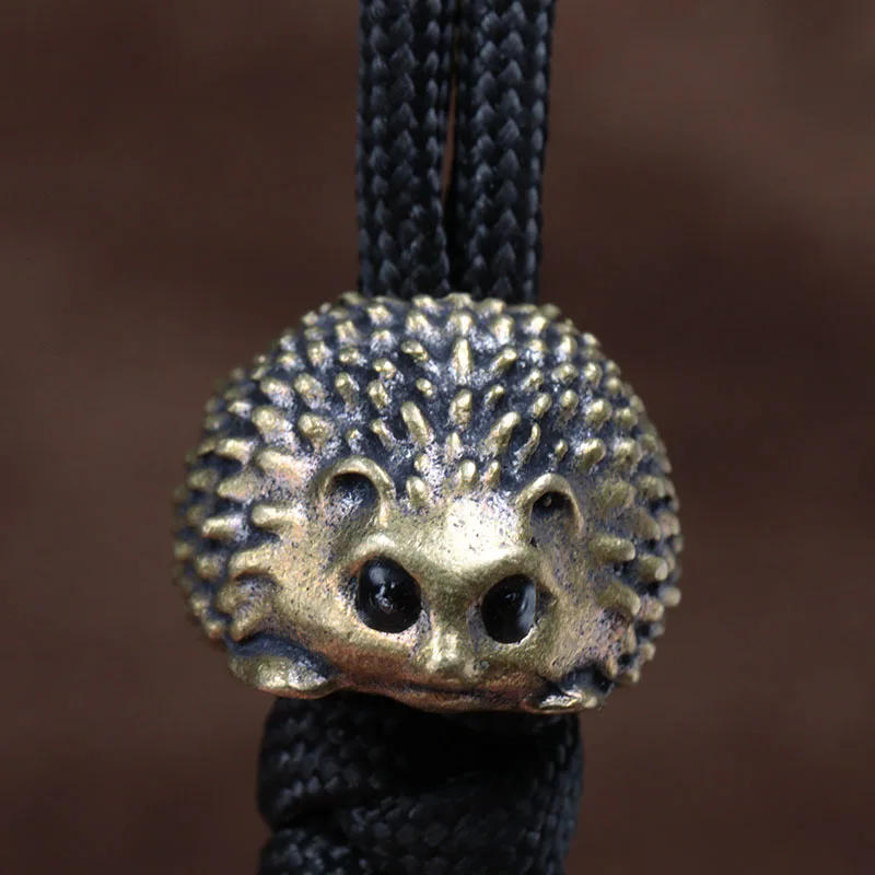 Description Picture 6 of itemHedgehog Brass Knife Bead EDC Outdoor DIY Paracord Woven Bracelets Accessories Lanyard Pendant Umbrella Rope Flashlight Hangings