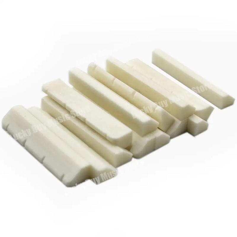 Description Picture 3 of itemBuffalo Bone Guitar Bridge Nut Saddle for 4 String Ukulele mini Guitar White Musical Stringed Instrument Guitar Parts