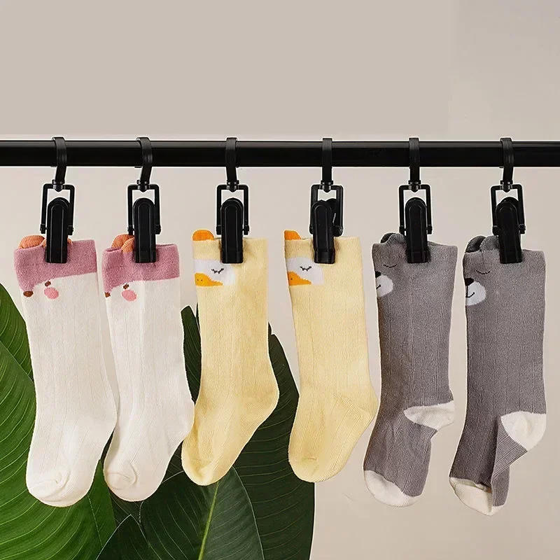 Description Picture 4 of item5/10/20PCS Rotating Clothespins Clamps Hanging Clothes Pegs Hooks Laundry Rotate Hat Clothespin Clamps for Home Storage Hangers