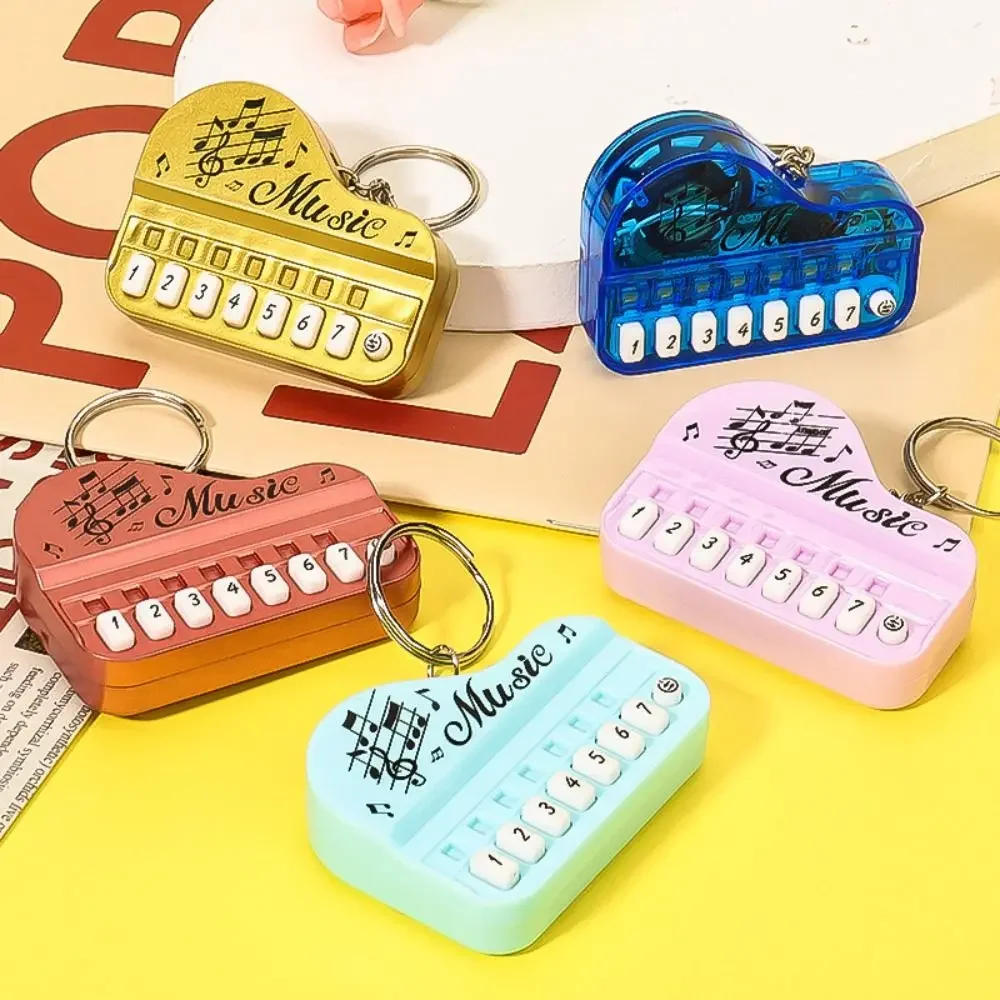 Description Picture 2 of item2024 Mini Electronic Keyboard Keychain Portable Musical Instrument Toy Bag Hanging Pendant Toy Gift