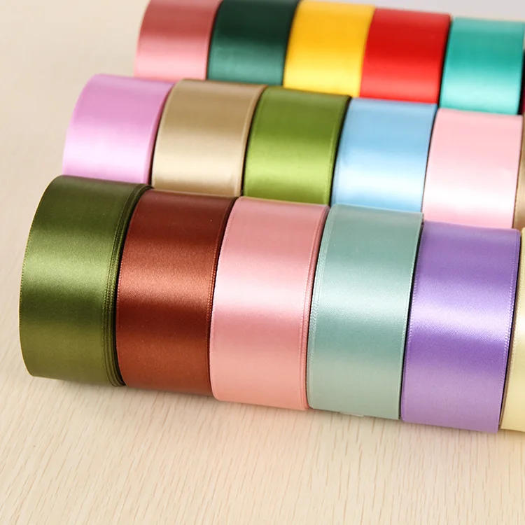 Description Picture 2 of item25Yards/Roll 6mm 10mm 15mm 20mm 25mm 40mm 50mm Silk Satin Ribbons for Gift Packing Christmas Party Decoration Fabric Crafts