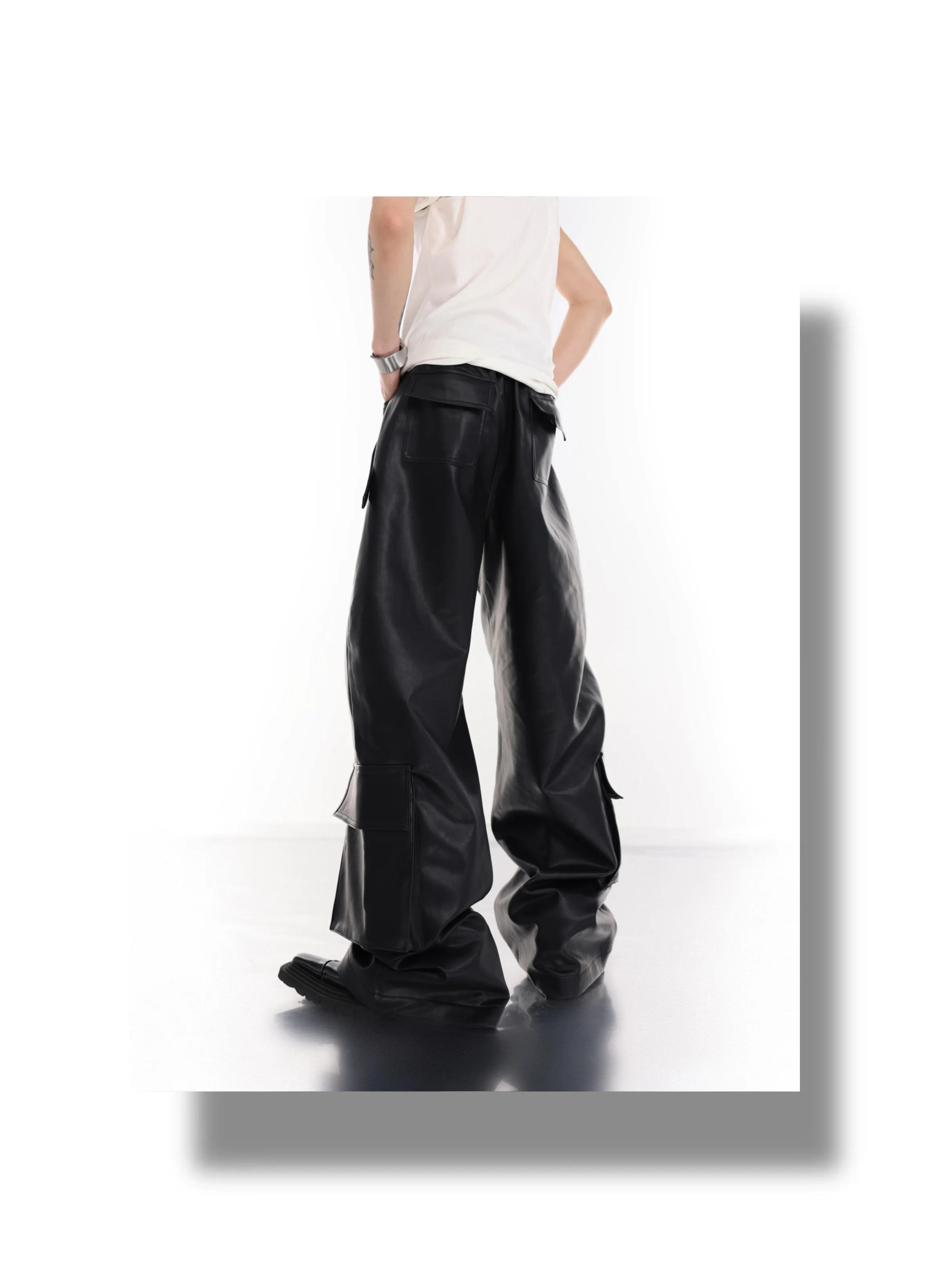 Description Picture 6 of itemPunk Style Avant-Garde Metal Rivet Techwear Tooling PU Leather Pants Large Pocket Wide Leg Loose Bell-Bottom Pants Trousers Men