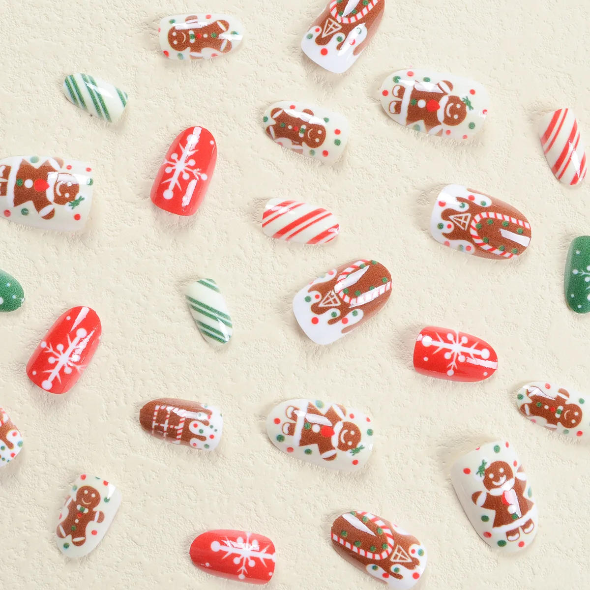 Description Picture 3 of item24Pcs Festive Cartoon Press-On Nails Set Oval Glossy Red&White Fake Nail Tips Christmas Gingerbread,Snowflake&Candy False Nail