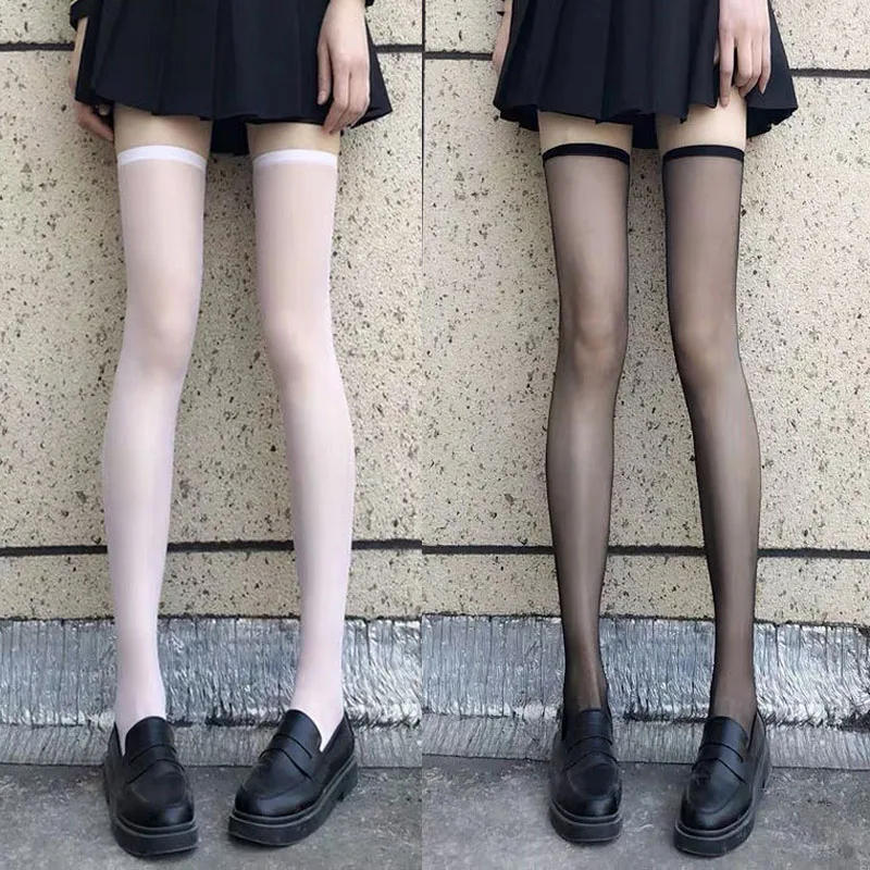 Description Picture 4 of itemLolita Bowknot Thigh High Long Socks Women Sweet Girls Black White Sexy Lace Over Knee Fishnet Stockings Gothic Mesh Legging