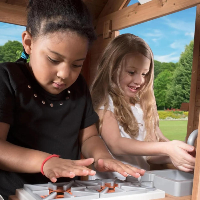 Description Picture 6 of itemDiscovery Scenic Heights All Cedar Wooden Playhouse, Upper Deck Cottage Style, Saloon Style Doors, Ladder, Stairs, Play Sink