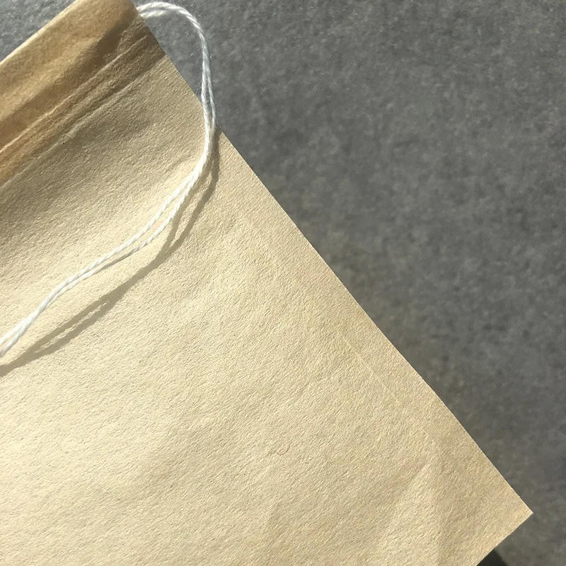 Description Picture 4 of itemDisposable Tea Filter Bags for Loose Tea and Coffee,Wood Pulp Unableached Empty Tea Infuser Sachets with Drawstring,100 Pack