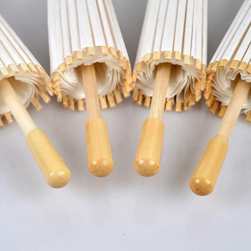 Description Picture 6 of itemChinese Craft Paper Umbrella, Wedding Photograph Accessory, Party Decor, White Paper, Long-handle Parasol, 60 cm, 80cm, 50Pcs