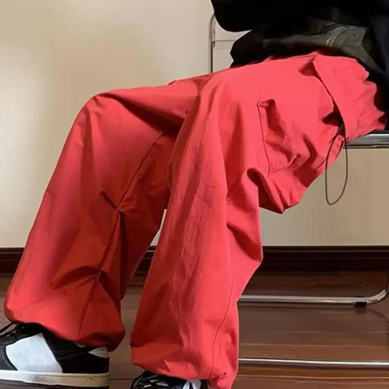 Description Picture 5 of itemStreetwear 2024 Spring Harem Casual Pants Men Elastic Waist Solid Color Cargo Pants Multi Pocket Loose Baggy Pants For Women