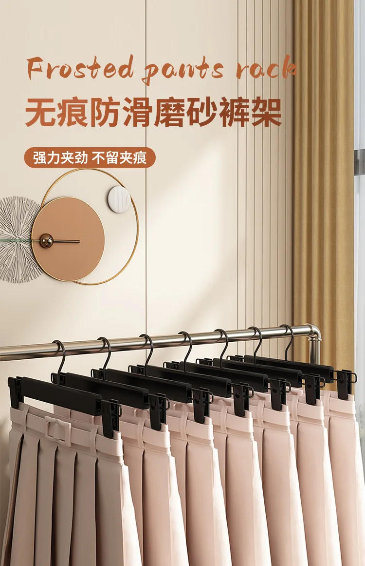 Description Picture 2 of itemHome Frosted Plastic Trouser Rack Strong Seamless Clip Hangers To Dry Clothes Hangers for Clothes Home Storage & Organization