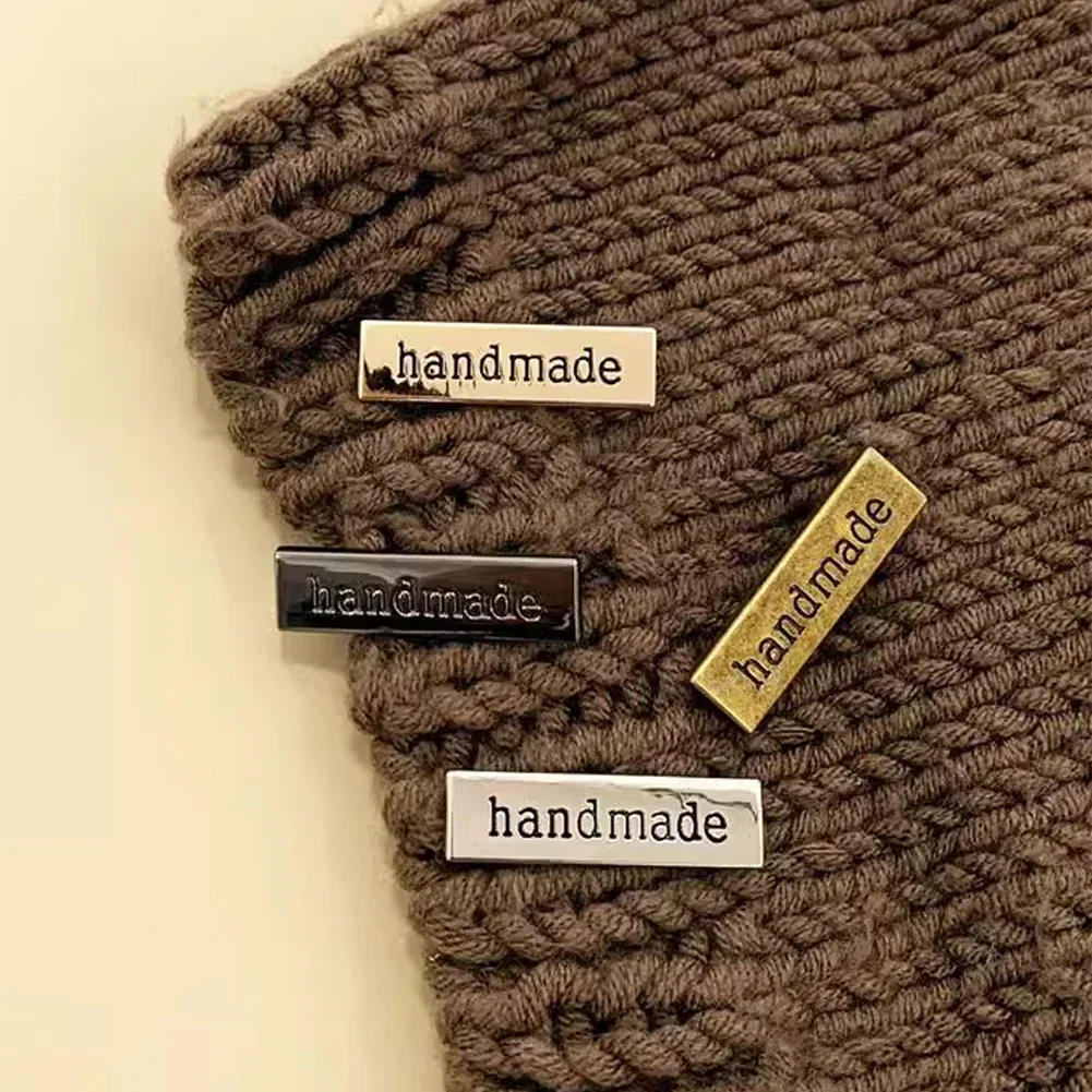 Description Picture 4 of item10Pcs Rectangle Metal Labels Zinc Alloy Die-casting Engraved Handmade Labels DIY Bags Crochet Clothes Hats Garment Labels Tags