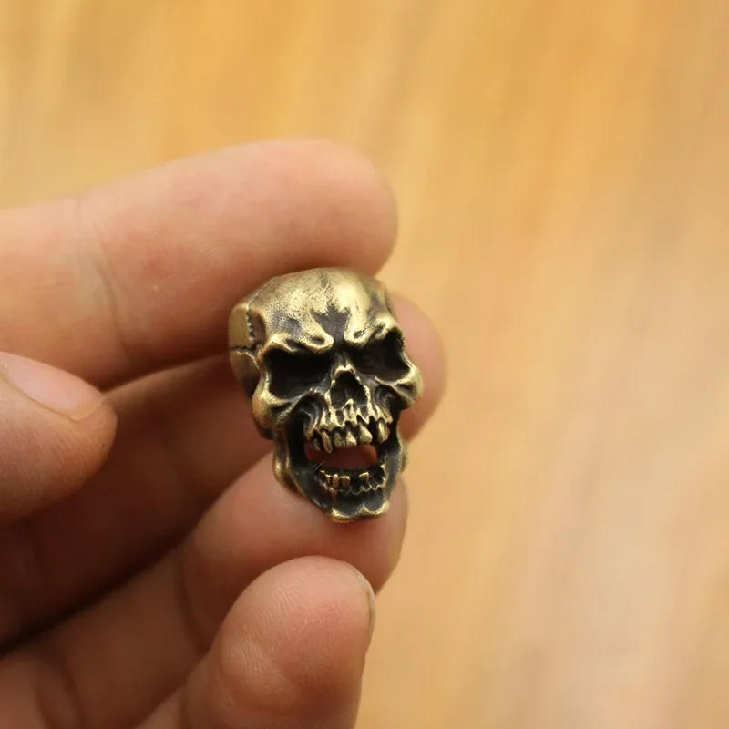 Description Picture 6 of itemCuspid Teeth Skull Head Brass Paracord Beads Lanyard Pendants DIY EDC Outdoor Tool Umbrella Rope Woven Knife Charms Accessories