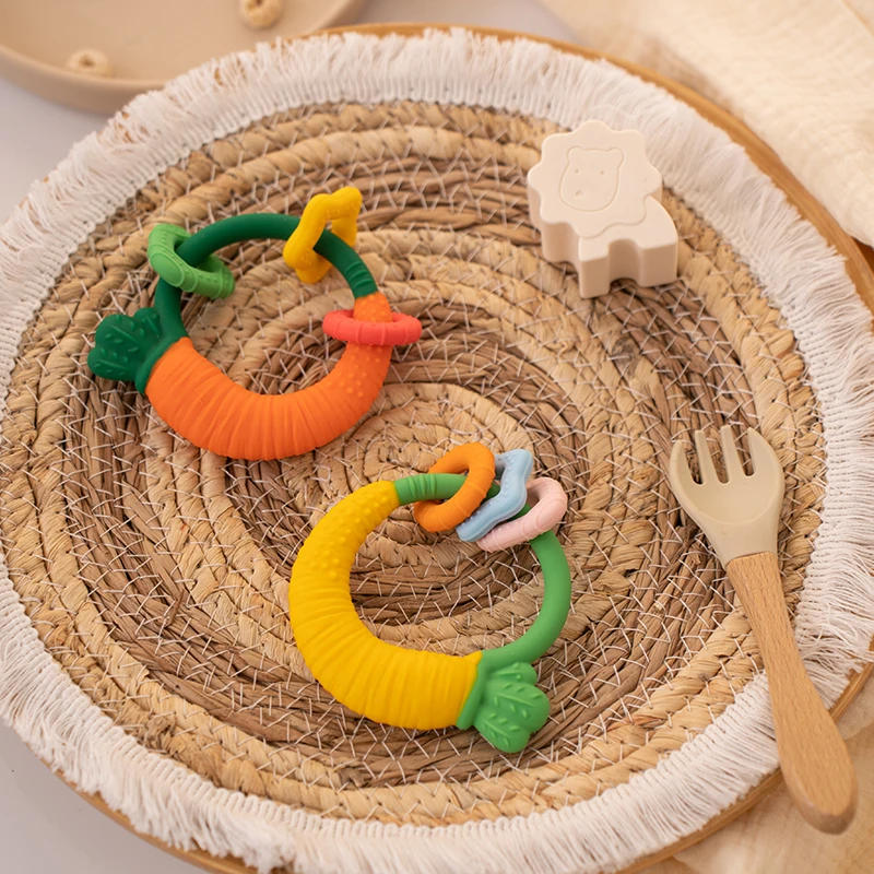 Description Picture 3 of itemFood Grade Baby Silicone Teethers BPA Free Cartoon Carrot Infant Teething Chew Toys for Boys Girls Shower Gift Baby Accessories