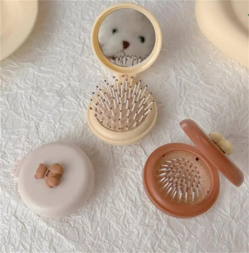 Description Picture 3 of itemCute Bear Foldable Head Massager Comb with Mirror Cartoon Air Bag Hair Comb Anti Static Styling Accessories Portable Hair Brush